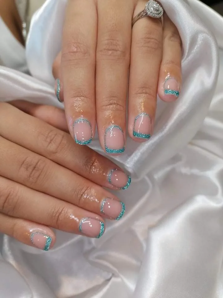 Wedding nails with delicate turquoise glitter tips